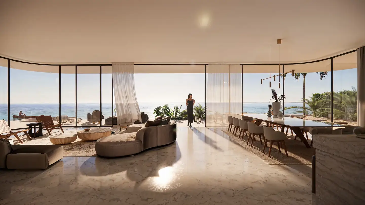 Open living and dining room facing the beach